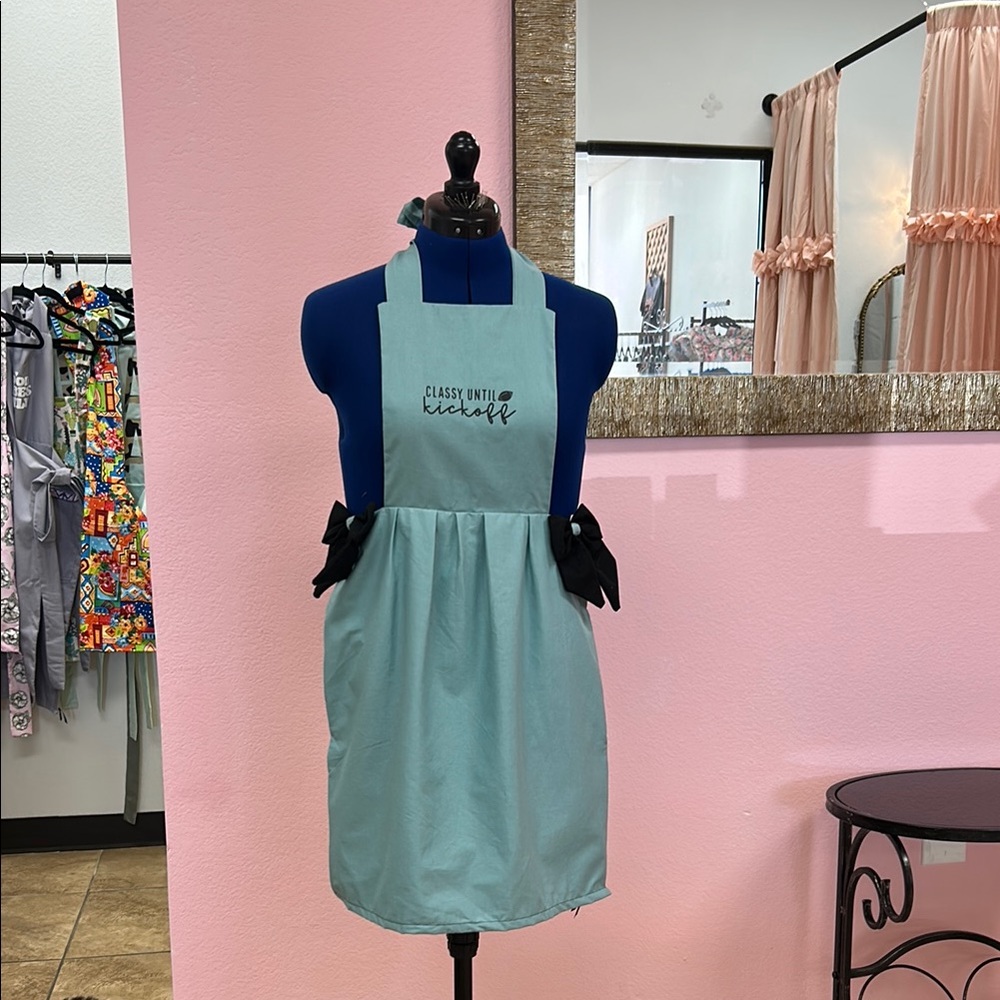 Women’s Aqua Apron  with Black bows adjustable with pockets